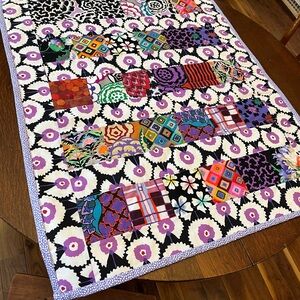 Handmade Vibrant Patchwork Quilt with Purple and Black Accents